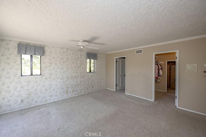 Primary Bedroom with Dual Walk In Closets