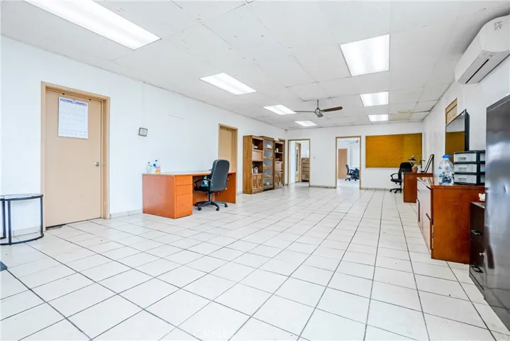 Assembly area facing the back of property into the dinning space.