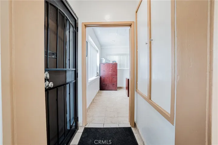 Main Entrance of the property facing into the office space located to the left as you enter the building.