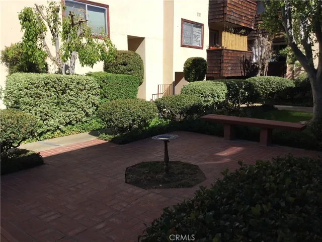 Serene birdbath and sitting area