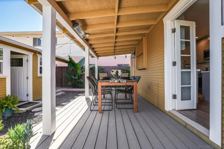 Oversized Trex deck for outdoor dining and entertaining! Beautiful landscaping! Cafe lights will convey with sale. Fully fenced in yard for privacy.