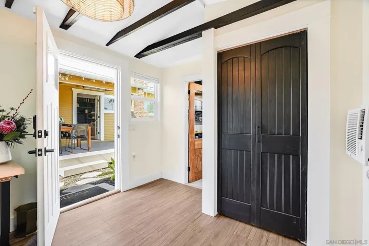 Part of garage converted to beautiful and functional home office / art studio with A/C! Cedar lined closet for clothing or other storage.