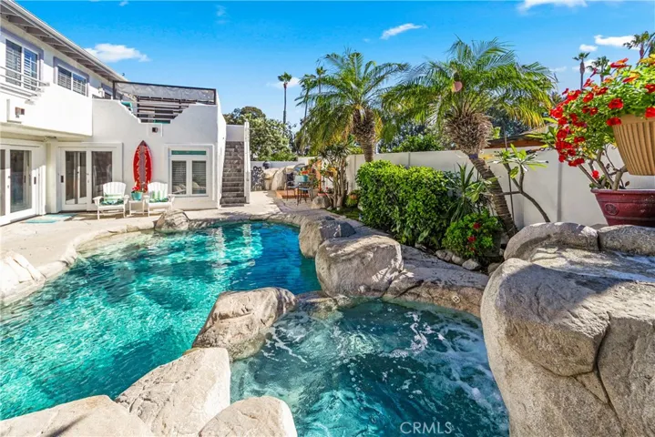 Gorgeous saltwater pool and spa. Upper patio deck is the perfect place for Sunsets!!