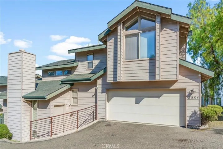 Exterior with large two-car garage
