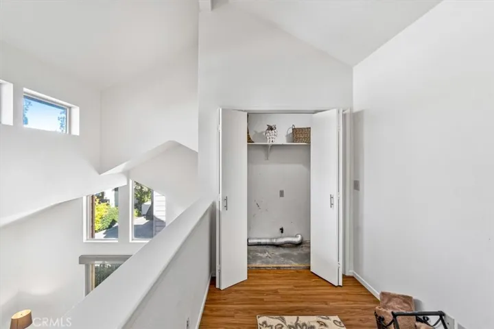 Upstairs loft area with access to the laundry room, bedroom and bathrooms