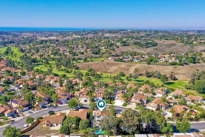 The lush green fairways of El Camino Country Club are just below & the Pacific Ocean is 5 min away!