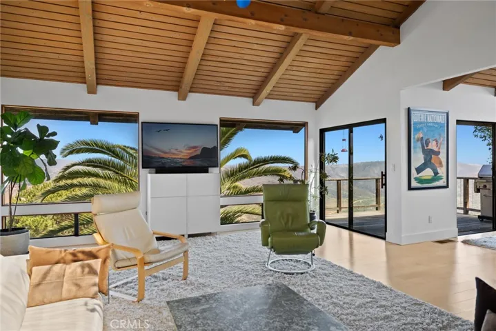 Numerous windows, including picture and clerestory, take full advantage of the four-bedroom, three- and one-half-bath design’s views.