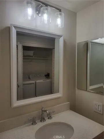 Updated Bathroom with Side by Side Washer and Dryer