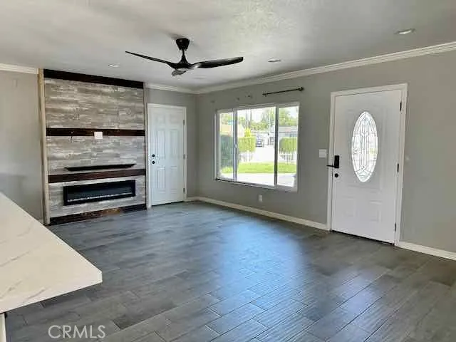 entrance, living room and gas fireplace