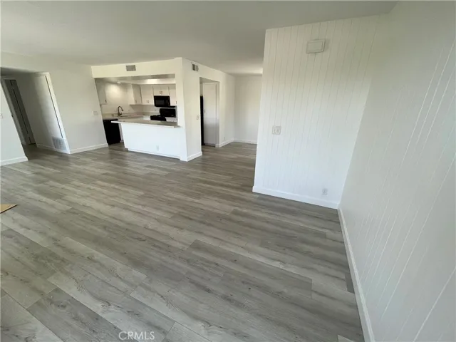 Living Room looking towards kitchen and dining room.