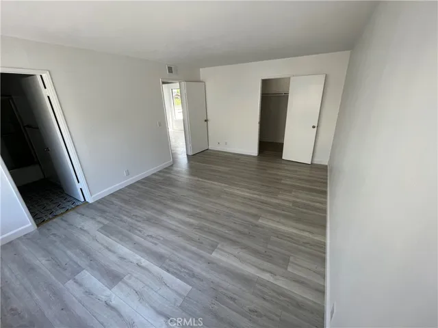 Spacious Master Bedroom with Private Bath and Walk-in Closet