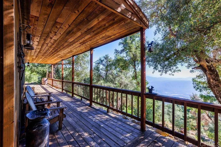 Such an inviting wrap-around deck.