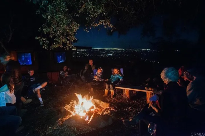Enjoy time around the campfire looking out to sparkling city lights, so close, but oh, so far away.