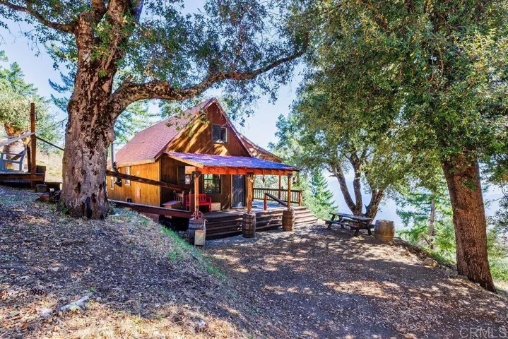 Three brothers flipped a coin for who would get what building pad.  John's cabin sleeps 10.