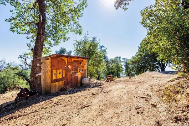 Take a walk to Jeff's cabin but first this cute little shed looks like it could be a bunkhouse!