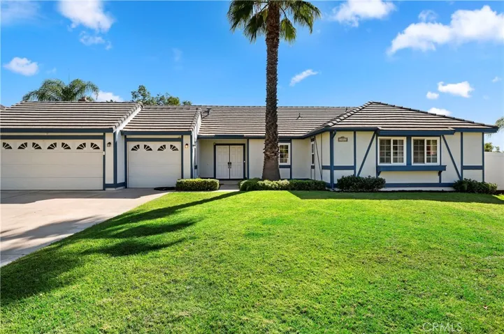 3 car garage & Landscaped Front Yard