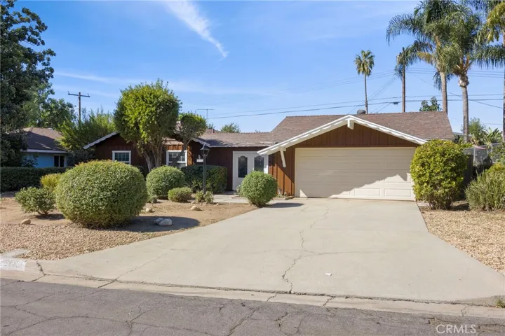 The driveway is level with the street, no slope
