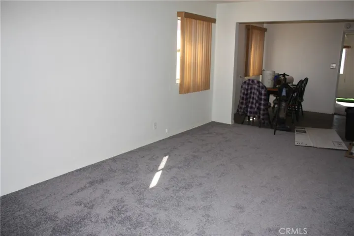 View from the front door. Living room to the dining area