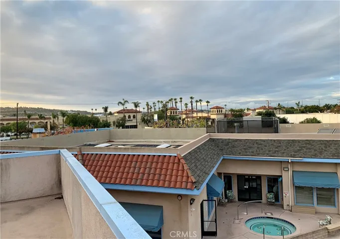 Huge HOA roof deck with room to relax and bar b q.
