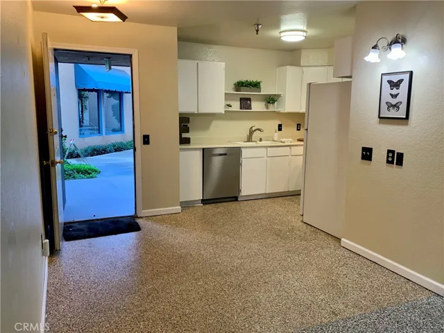 Front door looks out to pool and hot tub area.