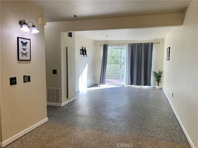 Huge living room leads to your private rear deck.