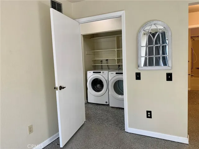 Laundry is just outside your bedroom