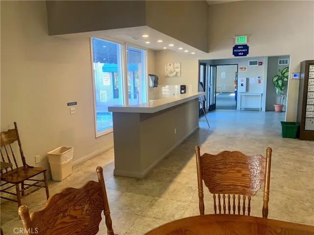 Common area with bar and dining room.