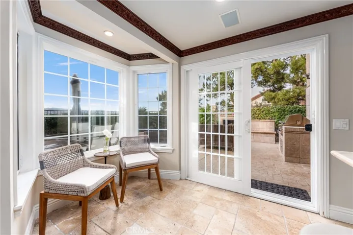 Unique bay window and sliding door leads to the backyard