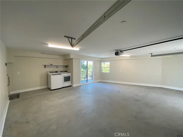 Garage and Laundry Area Off of Living Room.