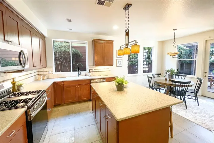 Kitchen and Dining area leading to patio