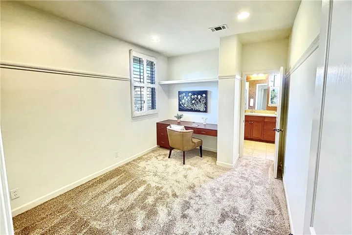 Upstairs Second Bedroom with built-in desk