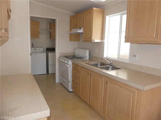 Kitchen and view to the Laundry Room