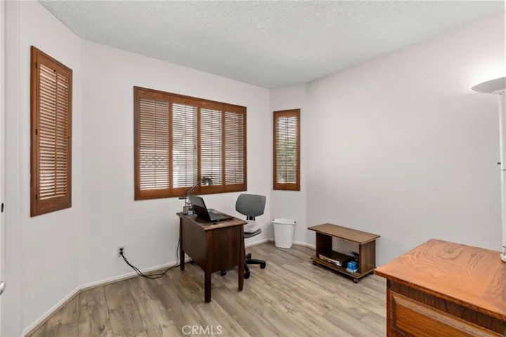 3rd bedroom with closet used as an office