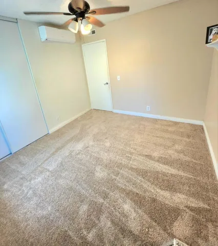 Fresh new carpet in bedroom.