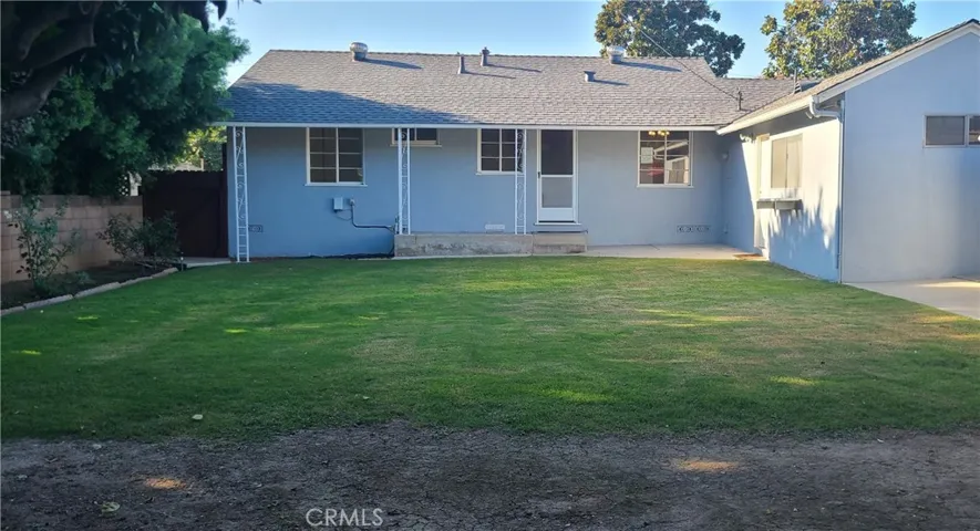 Back view of house and back yard
