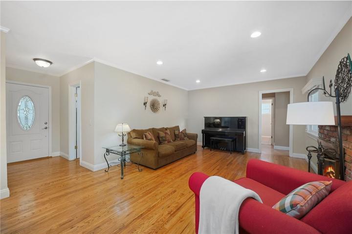 View of front door and formal living room