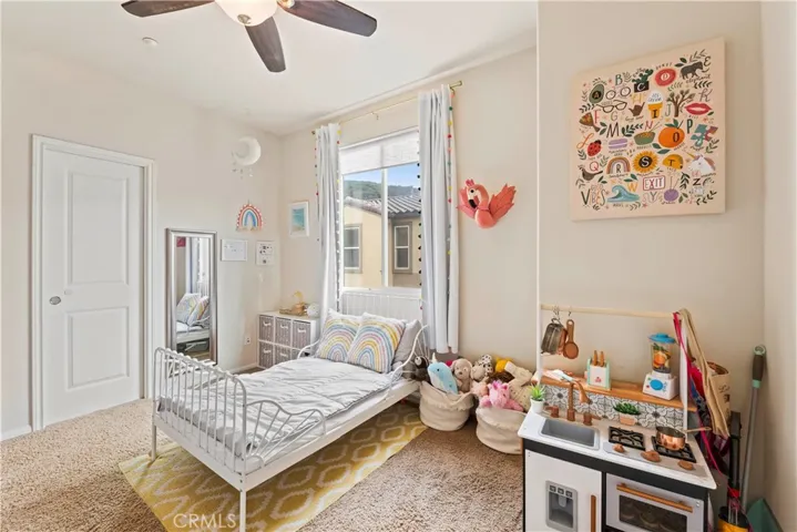 Secondary primary bedroom with full ensuite bathroom.