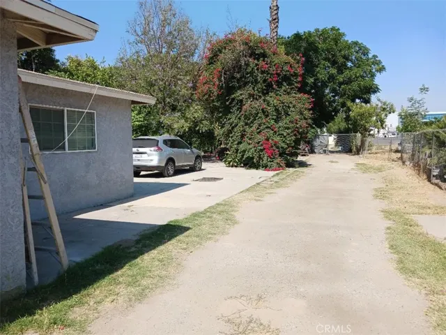 Driveway that leads to back of lot