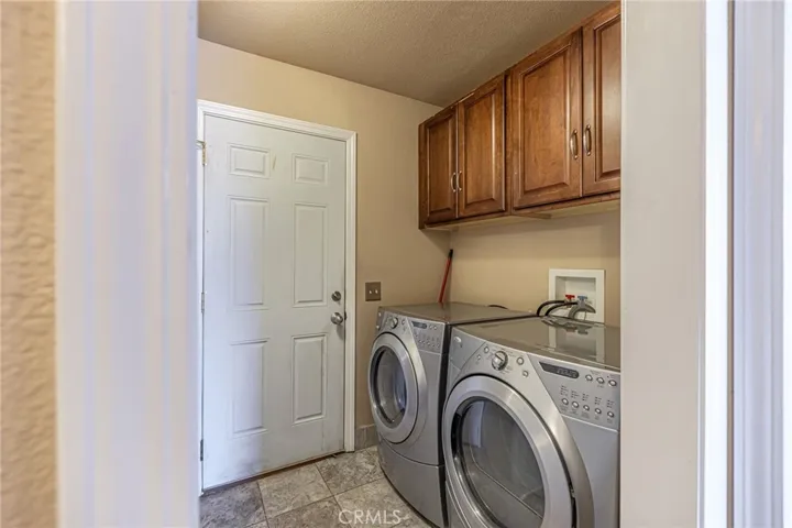 Laundry area and exit to garage