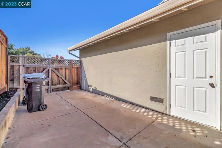Fenced side yard for storage