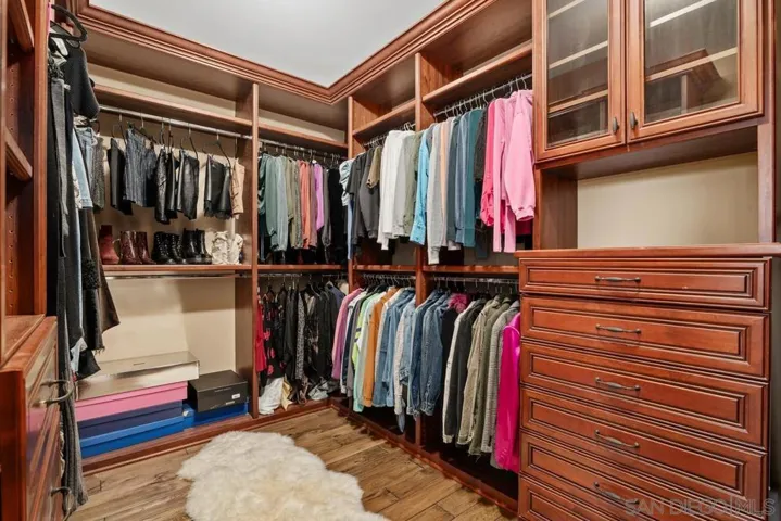 One of two primary bedroom walk in closets