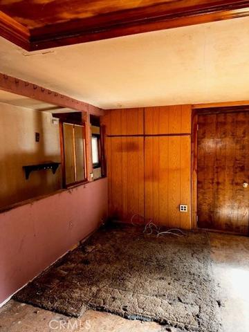 main level looking with stairs to lower level to the left