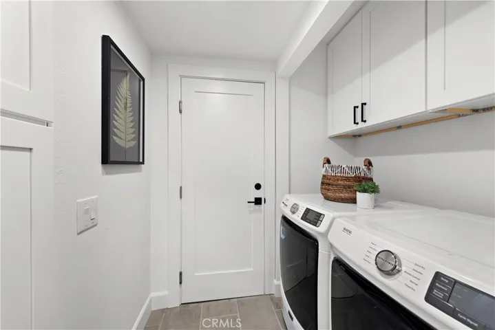 Indoor Laundry Downstairs Leading to Garage