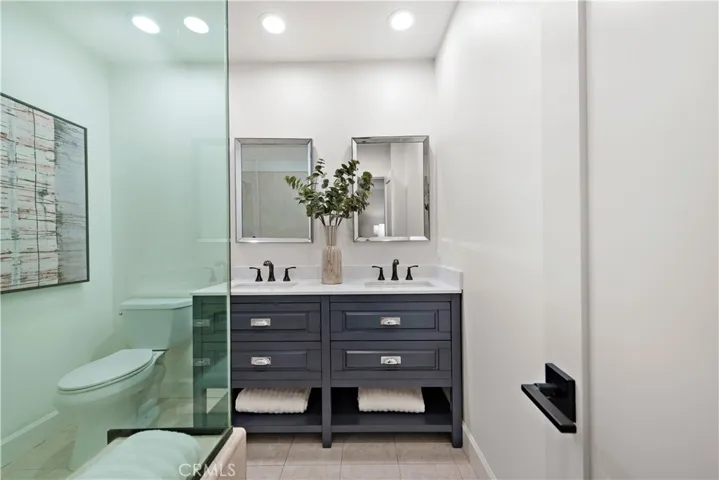 Primary Bathroom with Double Sinks and Walk in Shower