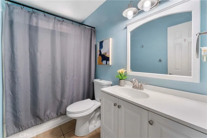 Full bathroom at the end of the hallway.