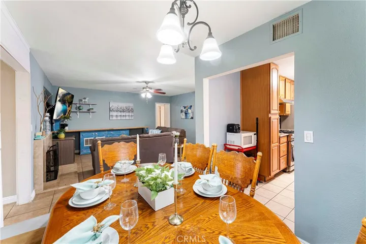 Dining area looking towards the living room. Right of image: galley kitchen. Left of image: to the family room.