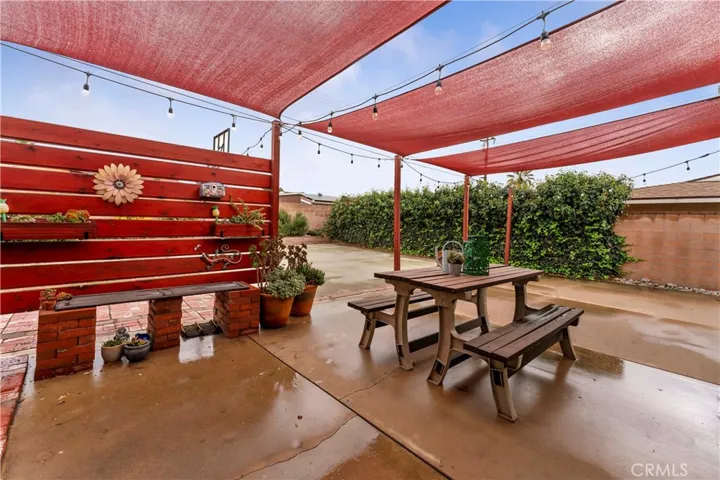 Once outside of the French doors, find refuge with a spacious backyard to enjoy.