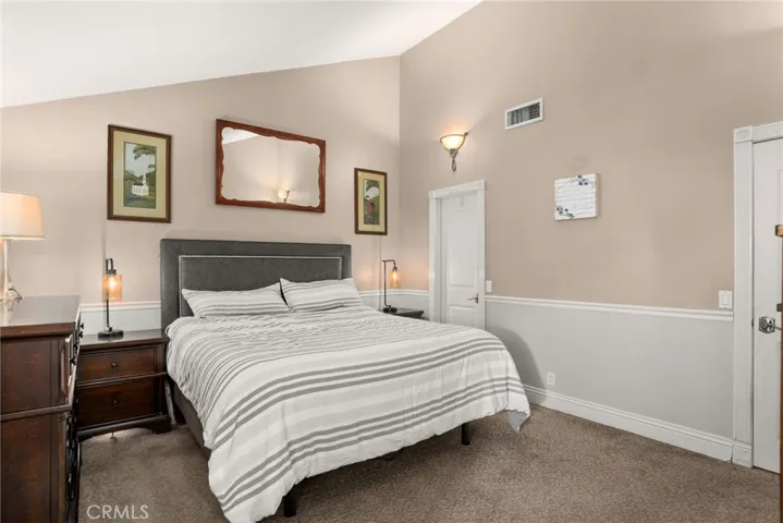 Primary suite with high ceilings.