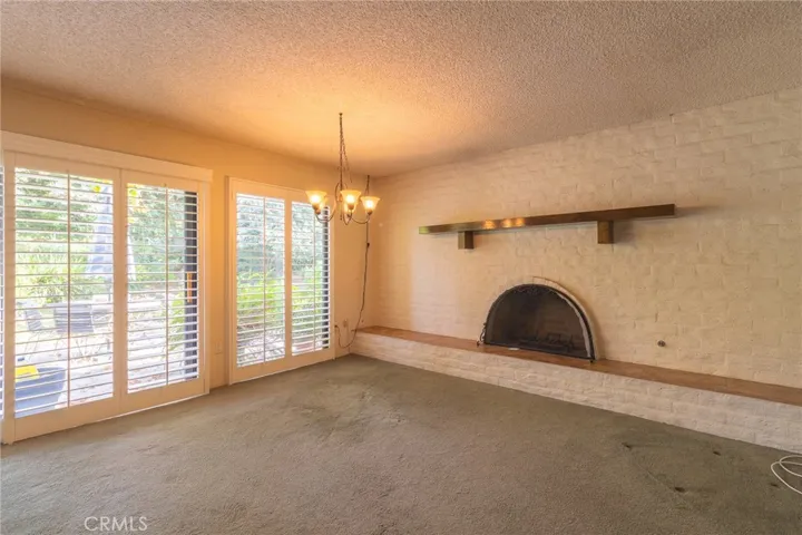 Family room with fireplace.