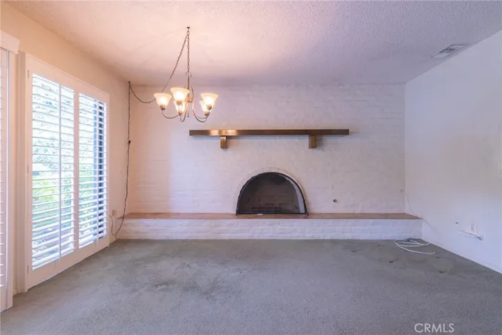 Family room with fireplace.
